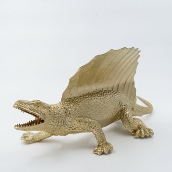 Dinosaure en plastique doré