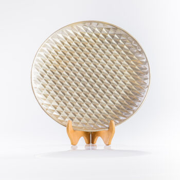 Assiette dorée motifs géométriques