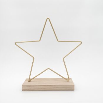 Etoile dorée sur socle en bois